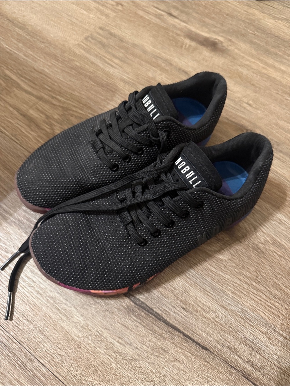 NOBULL Black Athletic Training Shoes with Subtle Rainbow Accents